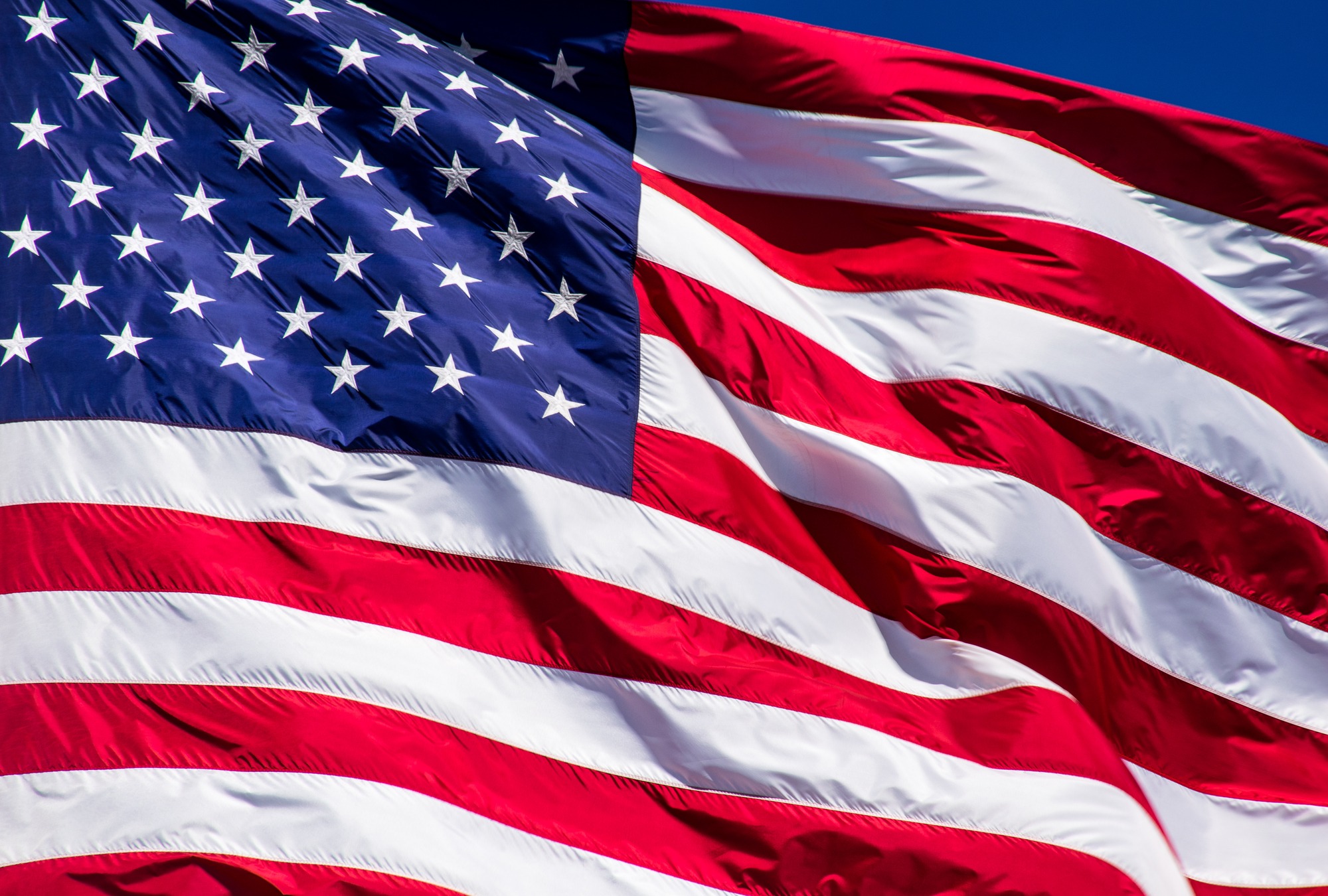 Perfect American Flag With Perfect Waves With a Small Corner of Perfect Blue Sky. A Patriotic National Flag That Stands for Freedom